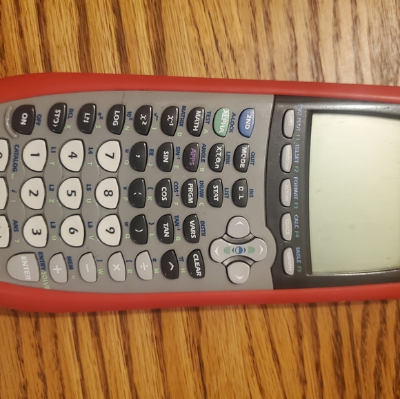Texas Instruments TI-84 Plus Graphing Calculator  Silver with red silicone cover - Picture 1 of 3